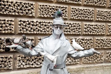 Metallic painted human statue to illustrate ‘Record’ number of UK universities put pay rises on hold