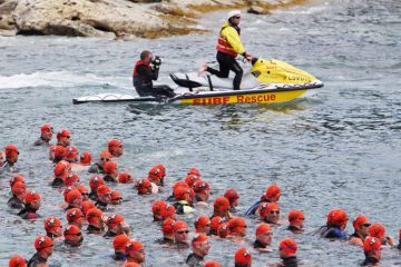 The annual Pier to Pub open water swimming race in Lorne. Victoria  Australia to illustrate Australian accord’s challenge: boost enrolments in sceptical era