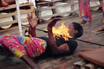 Young man limbo dancing Kenya East Africa Africa to illustrate International scholars ‘in limbo’ awaiting details of UK visa salary rules