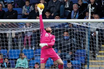 Goalkeeper tips a shot over the bar to illustrate Many universities could face OfS sanctions for missing thresholds