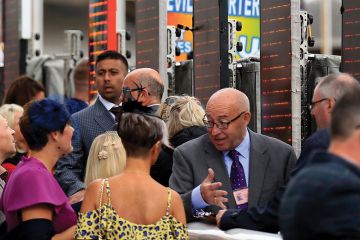Bookmakers at work ahead of racing at Doncaster Racecourse to illustrate the race is on