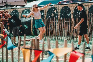Festival goers walk a tight rope during day two of Glastonbury Festival 2024 Festival goers walk a tight rope during day two of Glastonbury Festival 2024 to illustrate ‘Uncertainty and volatility’ ahead for UK student housing market