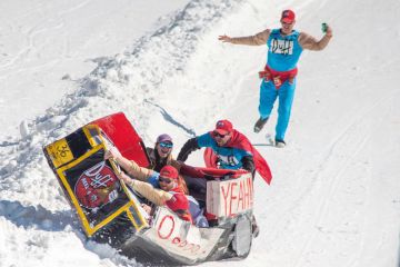Participants react after sledding down the mountain and crashing their Duff Brothers themed sled in Scranton, Pennsylvania. Participants react after sledding down the mountain and crashing their Duff Brothers themed sled in Scranton, Pennsylvania, to illustrate NCAA bankruptcy would ‘reshape college sports landscape’