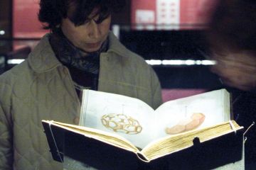 Two women looks at a drawing March 29, attributed to Leonardo da Vinci, part of a 15th century book on mathematics to illustrate Professors say decolonisation agenda ‘politicising’