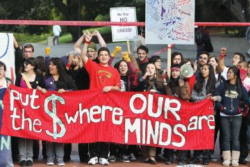 Student protest against funding cuts to illustrate Free college pledge alive despite defeat