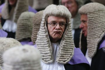 Judge showing an expression on his face to illustrate courting controversy