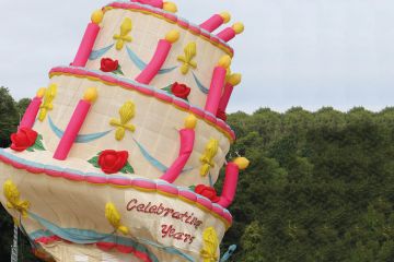 Deflated hot air balloon in the shape of a birthday cake at the 40th annual Bristol International Balloon Fiesta to illustrate Doubts over future of science department if Labour wins election