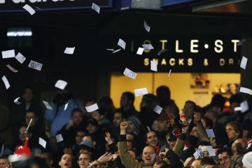 Arsenal throw fake bank notes prior to the Barclays Premiership match in London, England Arsenal throw fake bank notes prior to the Barclays Premiership match to illustrate Alarm over ‘staggering’ leadership pay at UK private providers