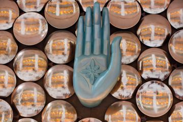 An indian mudra, a finger gesture, at New Delhi Indira Gandhi International Airport to illustrate More foreign academics report being denied entry to India