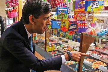 Rishi Sunak at a sweets' stand to illustrate move on from ‘sugar-rush’ policymaking