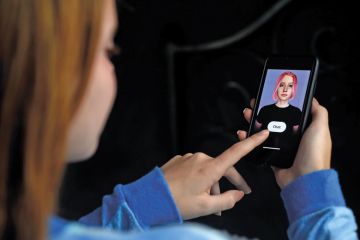 A virtual friend is seen on the screen of an iPhone A virtual friend is seen on the screen of an iPhone to illustrate AI chatbot can conduct research interviews on unprecedented scale