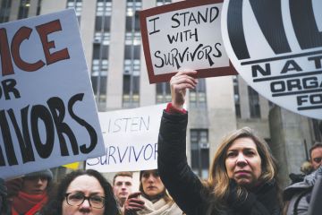 Protesters gather as Harvey Weinstein arrives at a Manhattan court house for the start of his trial on January 06, 2020 as a metaphor for US tactics to tackle sexual harassment, UKRI told