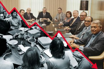 Montage image half black and white and half colour of a boardroom meeting with downward graph line Boardroom meeting divided graph line going down, half black and white half colour to illustrate Faculty-administrator distrust is making US universities ungovernable