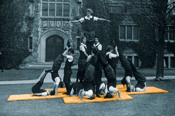 Team of lady acrobats practise on a lawn to illustrate Irish universities’ gender rebalance may not persist