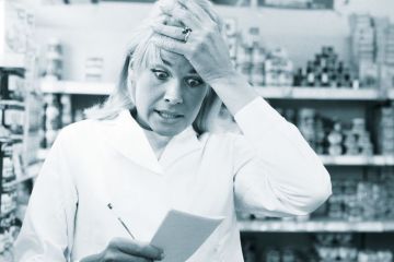 Shocked lady looking at her notepad to illustrate UK rejects ‘inexplicable’ price hike for Nature journals