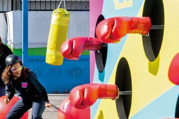 Boxing gloves total wipeout game to illustrate Omnicrisis as usual?