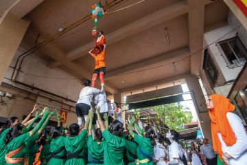 Students of Shreemati Nathibai Damodar Thackersey (SNDT) college form a human pyramid to illustrate Shift to Indian enrolment brings new challenges for US colleges