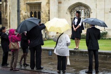 Students and their family and frinds queue outside the Senate house in Cambridge for Degree ceremonies Students and their family and frinds queue outside the Senate house in Cambridge for Degree ceremonies to illustrate Leading universities urged to rethink growing graduation costs