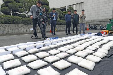 Seized bags of methamphetamine on display at the parking lot of the Seoul Metropolitan Police Agency to illustrate Korean student drug ring highlights ‘dog-eat-dog’ culture
