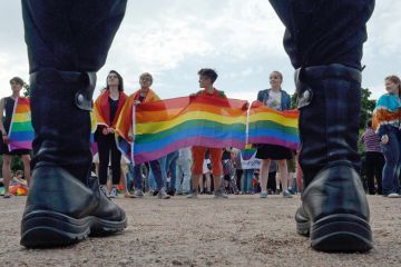 People wave gay rights' movement rainbow flags during the gay pride rally in Saint  Petersburg to illustrate Decolonisation is far from progressive under autocracy