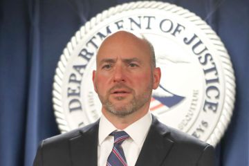  Andrew E. Lelling giving a press conference as this story is about him.