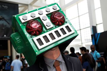   A man in a Destructoid costume on his head as Stanford students sour on big tech careers amid ethics concerns