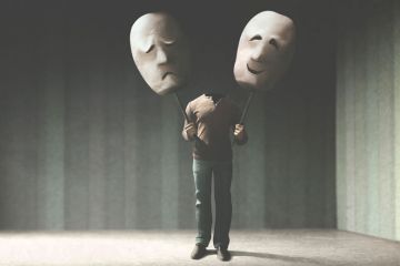 Illustration of a person without a head holding comedy masks to illustrate Let’s not turn academia’s divine comedy into a tragedy