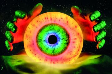 Hands out with a crystal ball with a close up of an eye image inside to illustrate the trick is to make predictions that are vague enough.