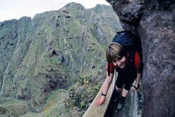 lady tight path smiling_climb_rocks getty.jpg