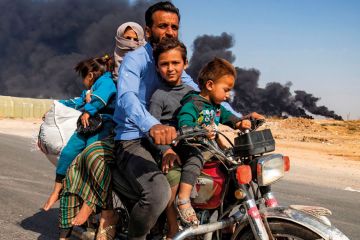 family on motorbike