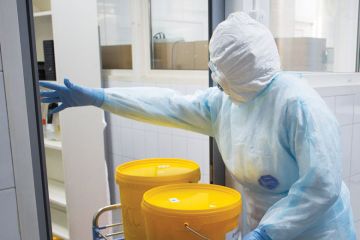 Health worker wearing personal protective equipment