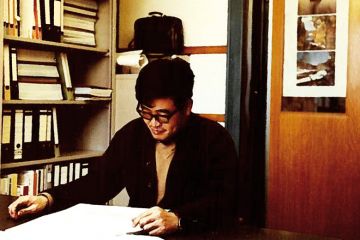 Weimin Wu at work in office, Switzerland Weimin Wu at work in office, Switzerland