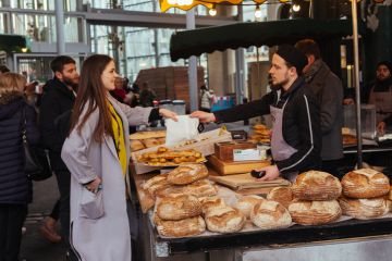 woman buying bread on the Camden Market