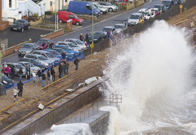 Wave crashing against wall