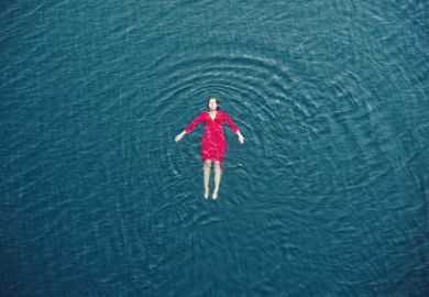 A woman floating in the sea