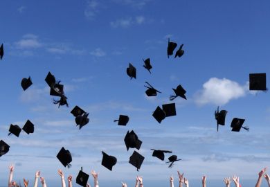 Graduates celebrate the award of their university or college degrees Graduates celebrate the award of their university or college degrees