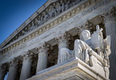 A summer day in front of the US Supreme Court Building in Washington, DC.