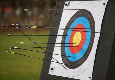 An archery target full of arrows