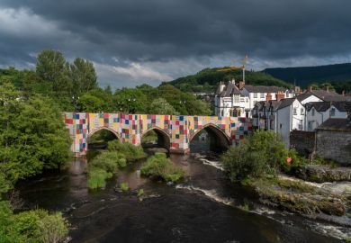 A temporary art installation with support from the Welsh Government, by Luke Jerram. Commissioned by the Eisteddfod in Llangollen. The 60m long bridge, is wrapped on both sides in a giant patchwork to reflect the crafts and cultures of Wales.