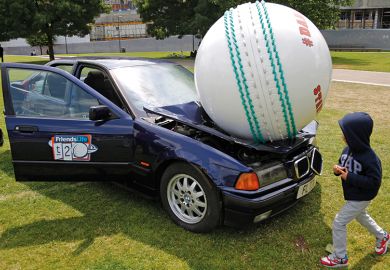 A ball crushing a car