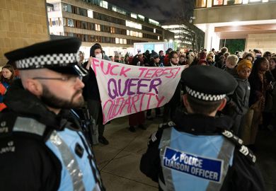 Edinburgh, Scotland, UK. 22 November, 2023. Pro Trans demonstrators stage a protest outside venue of the screening of the film Adult Human Female at Edinburgh University tonight amid a heavy police and security presence. 