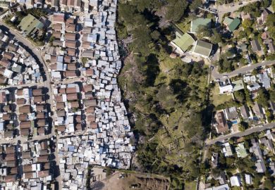 Aerial overhead township and middle class houses in South Africa
