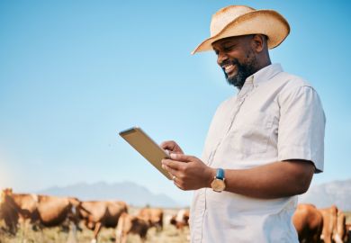An African man running an agribusiness
