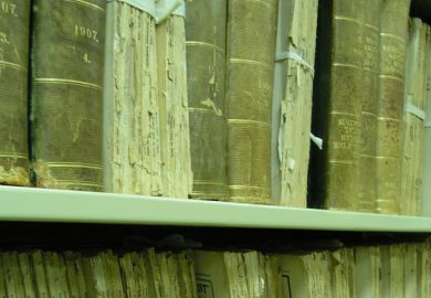 Aged medical journals on shelf