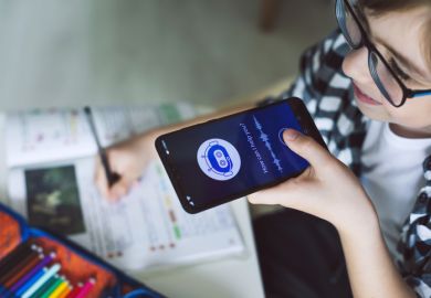 Someone holding their phone to their mouth, talking into an AI chatbot