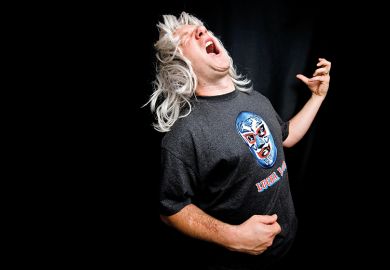 Man playing air guitar