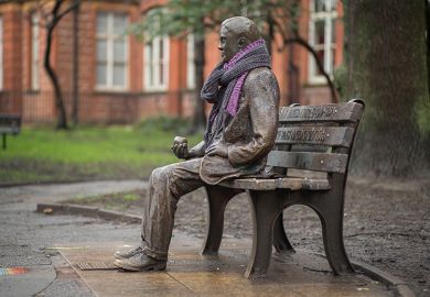 A statue of Alan Turing with a scarf sits in Sackville Park in Manchester, UK. To illustrate that cuts to QR funding could have a chilling effect on the UK's global research strengths.