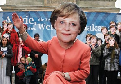 Some 350 demonstrators, wearing masks of German Chancellor Angela Merkel, take part in the “Looking for a climate chancellor” protest, 2009