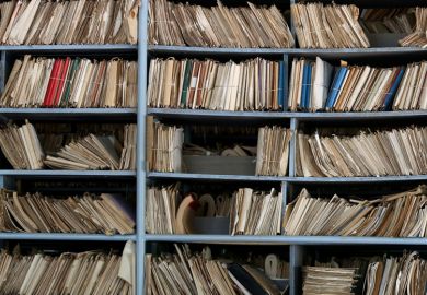 Archive of paperwork and files on shelves Archive of paperwork and files on shelves