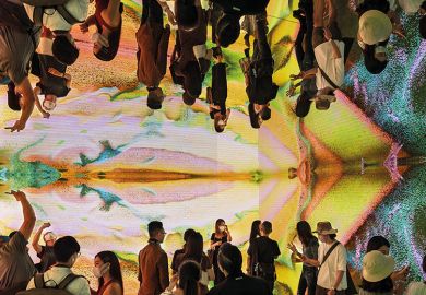 People visit immersive art installation “Machine Hallucinations Space: Metaverse by Refik Anadol at the Digital Art Fair Asia in Hong Kong, 2021 People visit immersive art installation “Machine Hallucinations Space: Metaverse by Refik Anadol at the Digital Art Fair Asia in Hong Kong, 2021